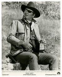 5d936 TRUE GRIT 7.75x9.75 still '69 c/u of John Wayne as Rooster Cogburn holding whiskey bottle!