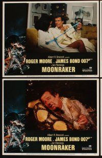 5h304 MOONRAKER 8 LCs '79 Roger Moore as James Bond unwraps sexy Bond girl!