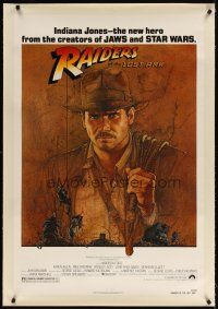 5j395 RAIDERS OF THE LOST ARK linen 1sh '81 great art of adventurer Harrison Ford by Amsel!