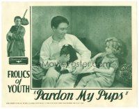 5m371 PARDON MY PUPS LC '34 Shirley Temple helps Junior Coghlan put sweater on his wounded dog!
