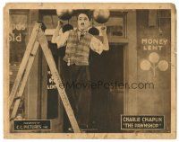 5m373 PAWNSHOP LC R22 wacky close up of Charlie Chaplin standing on ladder fixing lights!