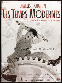 5r669 MODERN TIMES French 1p R02 different image of Charlie Chaplin sitting on giant gear!