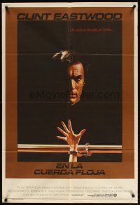 5s304 TIGHTROPE Argentinean '84 Clint Eastwood is a cop on the edge, cool handcuff image!