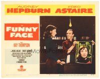 5y417 FUNNY FACE LC #3 '57 c/u of Fred Astaire showing Audrey Hepburn a picture of herself!