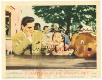5y530 IT HAPPENED AT THE WORLD'S FAIR LC #7 '63 Elvis Presley feeds pizza to young Asian girl!