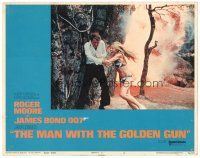 5y610 MAN WITH THE GOLDEN GUN LC #2 '74 Roger Moore as Bond escapes w/sexy Britt Ekland in bikini!