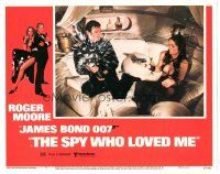 5y843 SPY WHO LOVED ME LC #5 '77 Barbara Bach holds Moore at gunpoint as he's opening champagne!