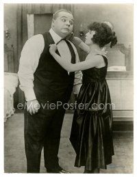 6b093 ROSCOE FATTY ARBUCKLE/MABEL NORMAND 10x13.25 still '10s she's tying his tie too tight!