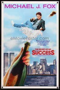 6g658 SECRET OF MY SUCCESS 1sh '87 wacky image of Michael J. Fox & huge bottle of champagne!