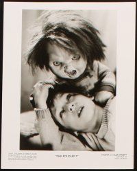6f035 CHILD'S PLAY 2 presskit w/ 10 stills '90 image of Chucky cutting jack-in-the-box w/scissors!