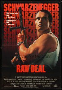 6k702 RAW DEAL 1sh '86 great close up of tough guy Arnold Schwarzenegger with gun!