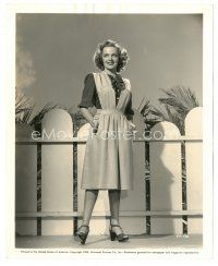 6m290 ELYSE KNOX 8x10 still '43 the pretty actress in jumper dress by fence by Ray Jones!