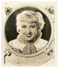6m481 JOAN BLONDELL 8x9.25 still '30s great smiling portrait looking through ship's porthole!
