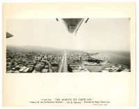 6m618 MARCH OF TODD-AO 8x10.25 still '58 cool widescreen image of plane flying over city!