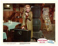 6m004 BUS STOP color 8x10 still '56 bewildered Marilyn Monroe with overcoat and suitcase!