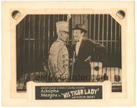 6s466 HIS TIGER LADY LC 1928 Adolphe Menjou smiles at circus drum major by the animal cages!
