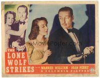6s574 LONE WOLF STRIKES LC '40 Joan Perry looks at the gun & jewelry in Warren William's hands!