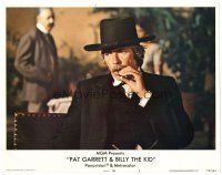 6s684 PAT GARRETT & BILLY THE KID LC #4 '73 Sam Peckinpah, close up of James Coburn smoking!