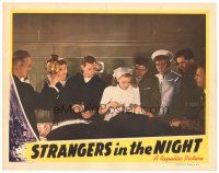 6s837 STRANGERS IN THE NIGHT LC '44 William Terry & men watch nurse Virginia Grey stitch man's leg!
