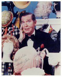 6t658 MILTON BERLE signed color 8x10 REPRO still '80s great portrait surrounded by costumes & wigs!