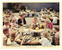 6t395 ROD TAYLOR signed color 8x10 still '60 great image eating with Eloi from The Time Machine!