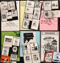 7a108 LOT OF 35 UNCUT PRESSBOOKS '60s-70s advertising for a variety of genres!
