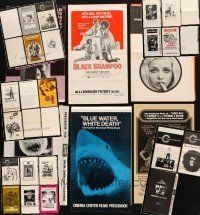 7a109 LOT OF 33 FOLDED AND UNFOLDED UNCUT PRESSBOOKS '60s-70s advertising from a variety of movies!