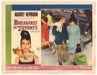 7d314 BREAKFAST AT TIFFANY'S LC #4 '61 Audrey Hepburn & George Peppard walk hand-in-hand in NYC!