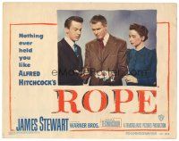 7d348 ROPE LC #8 '48 John Dall & Joan Chandler watch Stewart w/ murder weapon, Hitchcock classic!