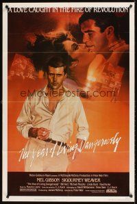 7h989 YEAR OF LIVING DANGEROUSLY 1sh '83 Peter Weir, artwork of Mel Gibson by Stapleton!