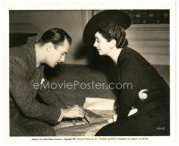 7j872 MAN WHO LOST HIMSELF candid 8x10 still '41 Brian Aherne shows Kay Francis how to read air map!