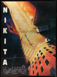 7k852 LA FEMME NIKITA French 1p '90 Luc Besson, cool overhead art of Anne Parillaud in alley!