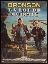 7k893 MURPHY'S LAW French 1p '86 different art of Charles Bronson & Carrie Snodgress by Mascii!