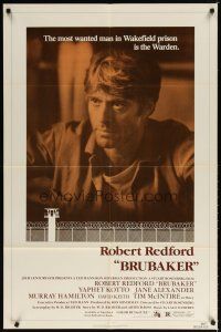 7r284 BRUBAKER 1sh '80 warden Robert Redford is the most wanted man in Wakefield prison!