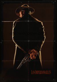 7r947 UNFORGIVEN Spanish/U.S. teaser 1sh '92 classic image of gunslinger Clint Eastwood w/back turned!