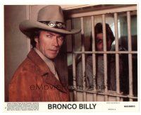 7s027 BRONCO BILLY 8x10 mini LC #2 '80 great close up of Clint Eastwood standing by prison bars!