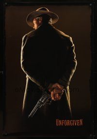 8b771 UNFORGIVEN undated teaser 1sh '92 classic image of gunslinger Clint Eastwood w/back turned!