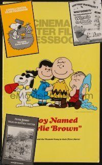 8e101 LOT OF 5 UNCUT ANIMATION PRESSBOOKS '70s A Boy Named Charlie Brown, Winnie the Pooh + more!