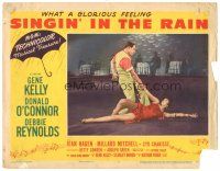 8g925 SINGIN' IN THE RAIN LC #7 '52 close up of Gene Kelly dancing with sexiest Cyd Charisse!