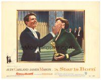 8g934 STAR IS BORN LC #1 '54 close up of James Mason slapping Judy Garland holding her Oscar!