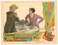 8g946 SYNCOPATING SUE LC '26 close up of pretty Corinne Griffith with fresh guy, cool border art!