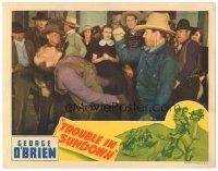 8g964 TROUBLE IN SUNDOWN LC '39 c/u of tough cowboy George O'Brien knocking out his opponent!