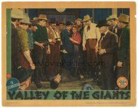 8g973 VALLEY OF THE GIANTS LC '38 Wayne Morris & sheriff by Claire Trevor, dead man & crowd!