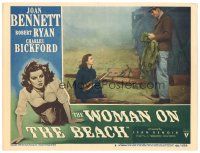 8g273 WOMAN ON THE BEACH LC #8 '46 Robert Ryan looks down at Joan Bennett collecting firewood!