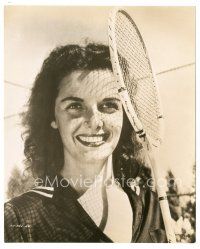 8k729 OUTLAW 7.5x9.25 still '46 c/u of sexy Jane Russell smiling big with tennis racket!