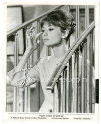 8k733 PARIS WHEN IT SIZZLES 8x10 still '64 great close up of beautiful Audrey Hepburn on stairs!