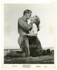 8k925 THEY CAME TO CORDURA 8x10 still '59 romantic c/u of kneeling Gary Cooper & Rita Hayworth!