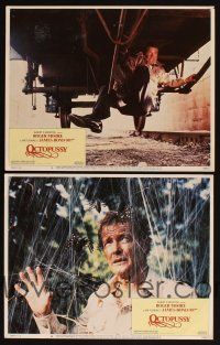 8r890 OCTOPUSSY 2 LCs '83 Roger Moore as James Bond under railroad car & with giant spiders!
