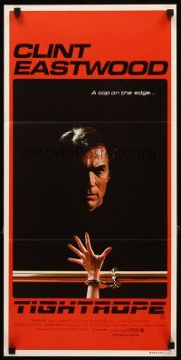 8t884 TIGHTROPE Aust daybill '84 Clint Eastwood is a cop on the edge, cool handcuff image!