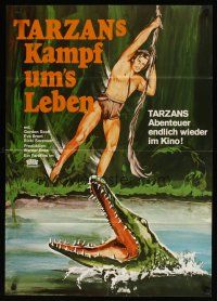 8t287 TARZAN'S FIGHT FOR LIFE German R69 art of Gordon Scott swinging on vine over alligator!